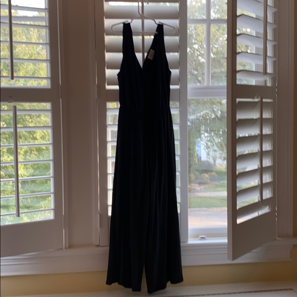 black jumpsuit with wide legs